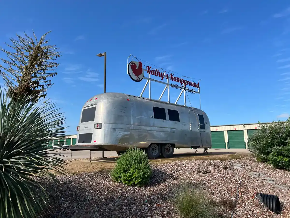 RV on a gravel storage facility driveway